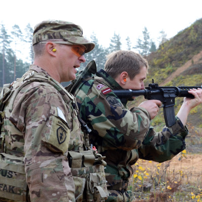 Frenchy calling targets on a range for Latvian soldier latvia 2014